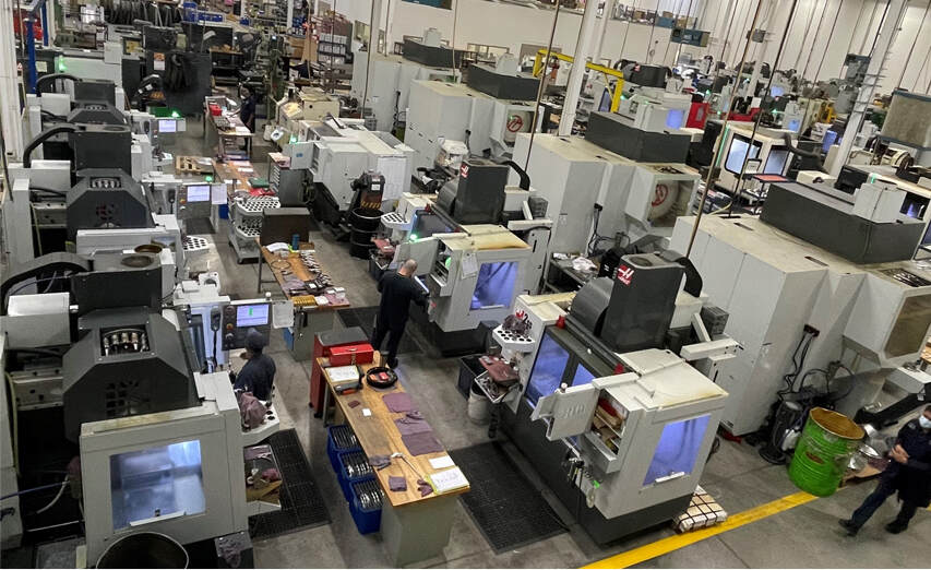 workers and machines in factory